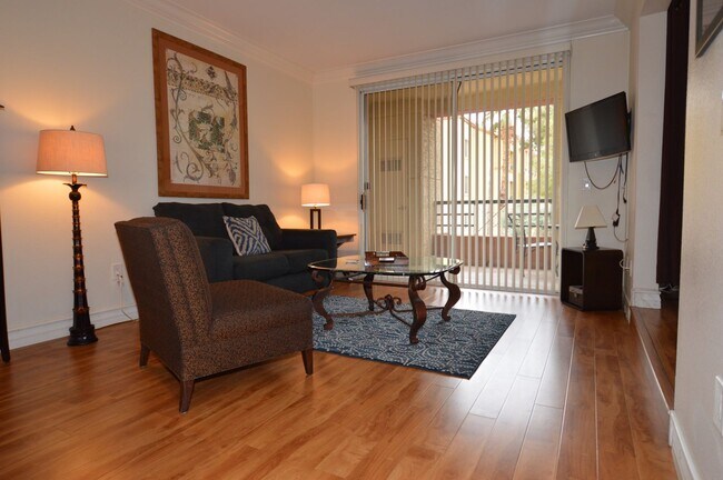 Building Photo - Charming Furnished Studio with Large Patio...