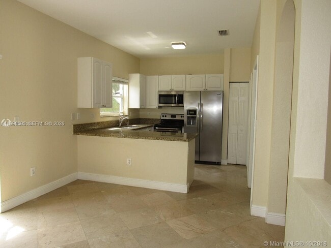 Building Photo - 14030 SW 51st Ln