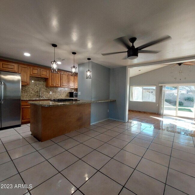 Building Photo - 1636 N 64th Dr