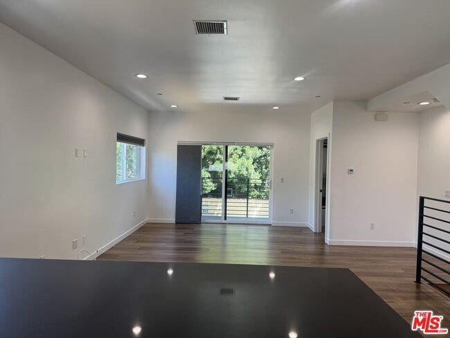 Building Photo - 5638 Woodman Ave