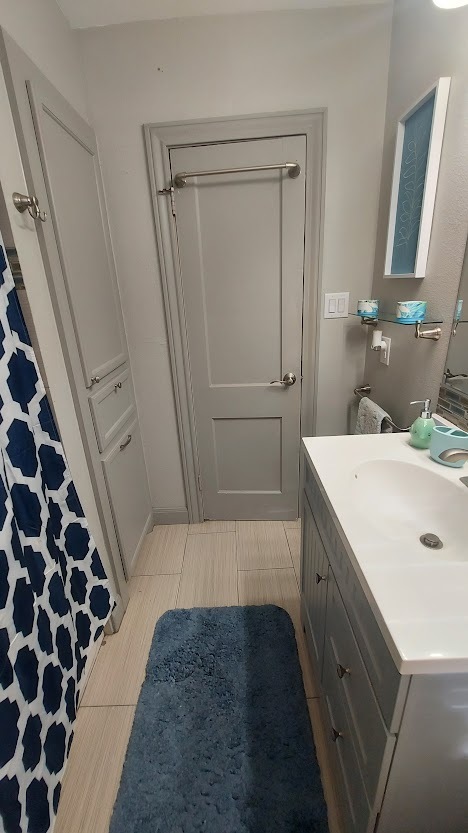 Alternate View of Bath With Custom Pullout Laundry Hamper - 3338 Blodgett St