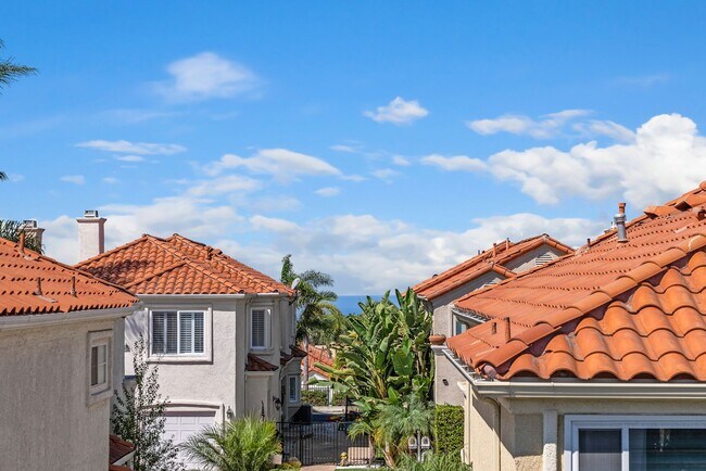 Building Photo - Coastal Elegance Meets Family Comfort in D...