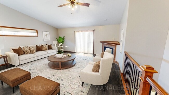 Building Photo - BEAUTIFUL 4 BD, 2 BA TOWNHOME WITH A FULLY EQUIPED KITCHEN, VAULTED CEILINGS, FIREPLACE, ATTACHED...