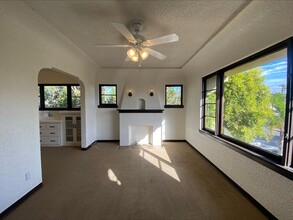 Building Photo - Craftsman Style One Bedroom with Decorative Fireplace! On Site Washer and Dryer & Assigned Storag...
