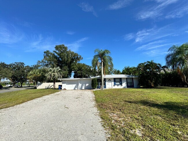 Building Photo - 2/2 with Fenced Yard, Garage and Laundry, ...