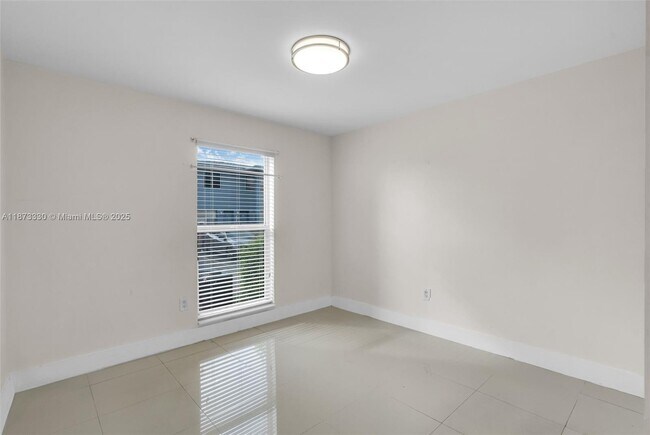 Building Photo - 241 S Royal Poinciana Blvd