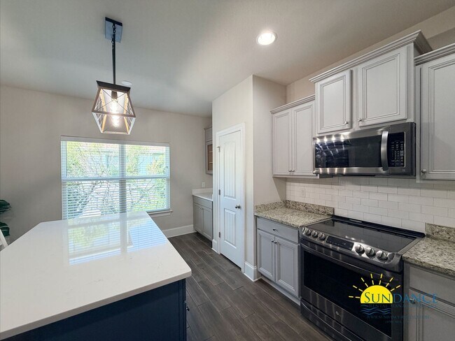 Building Photo - Highly Sought-After Gated Community with Resort-Style Pool, Just Off Scenic Highway 30A in Santa ...