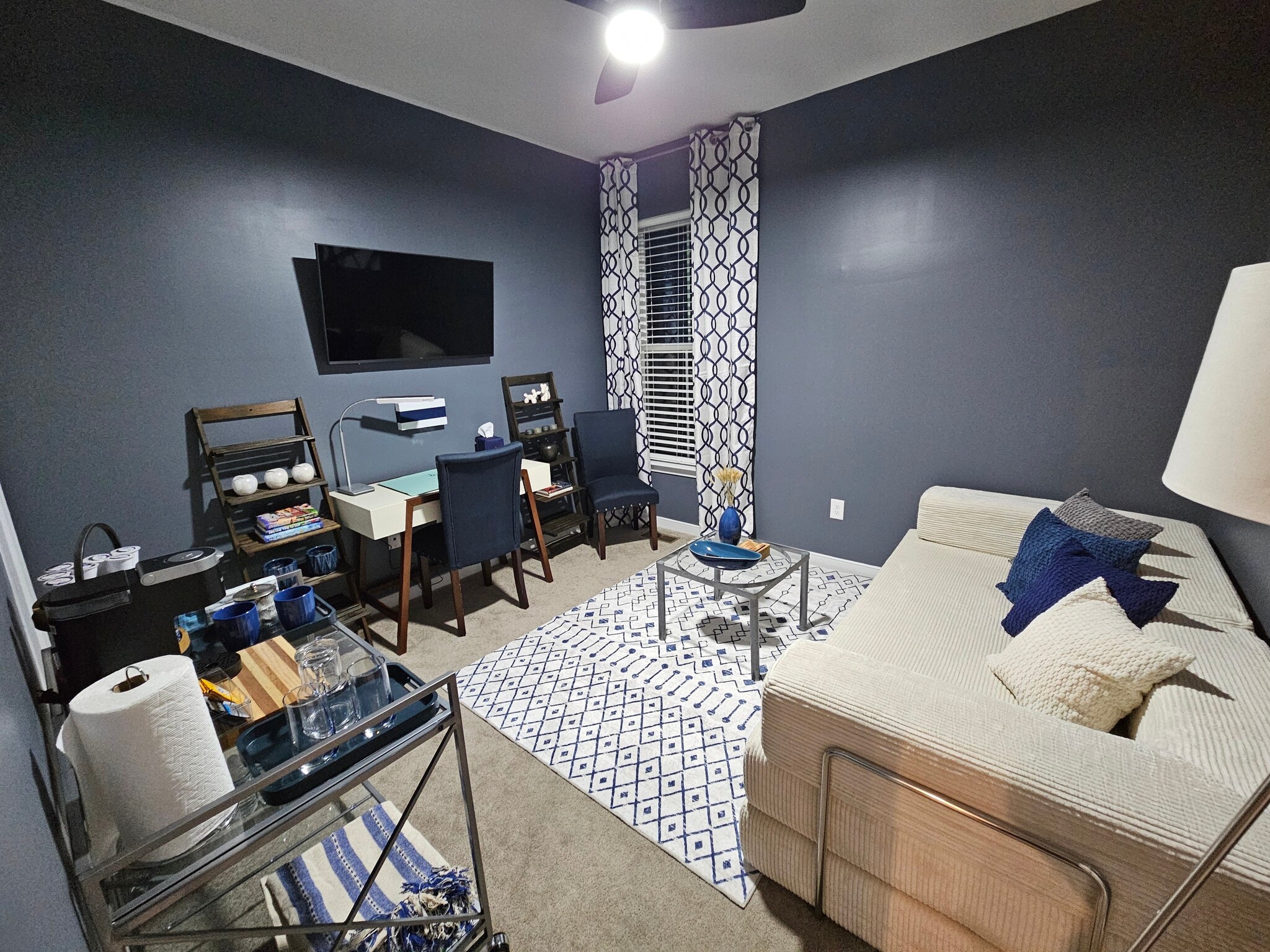 Work or watch TV in this room, which also includes a coffee bar. - 7201 Hancock Chase Ct