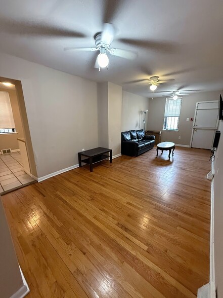 Huge Living Room With Mounted Electric Fireplace and TV - 2148 N Carlisle St