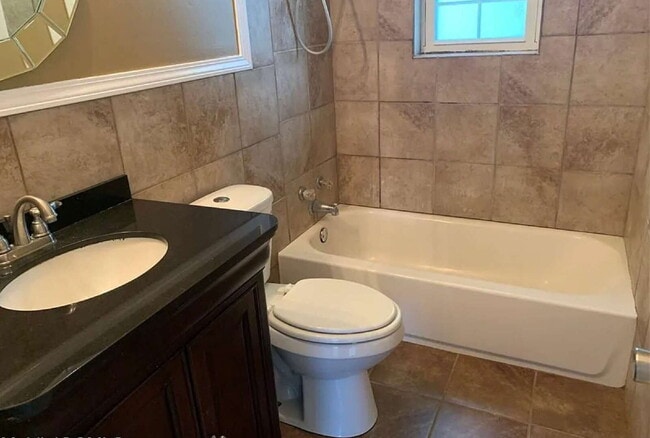 Building Photo - **This is a Furnished Room for Rent to col...