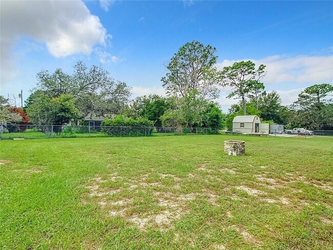 Building Photo - 5576 W Pine Cir