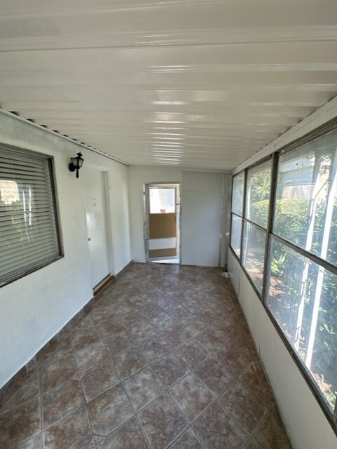 Good sized screened in patio, allowing extra room for easy living. - 5545 1/2 Allott Ave