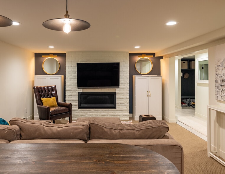 Basement family room includes guest fireplace - 1697 Pinehurst Ave
