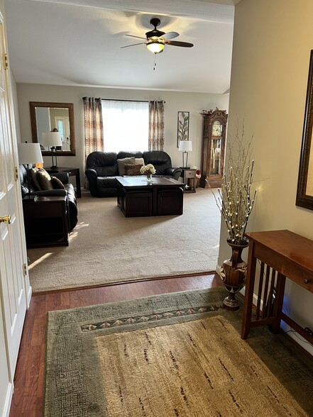 Living room with two full length couches. All for ends recline. - 1155 Swan Dr