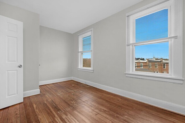 Building Photo - Charming Updated Rowhome in Belair-Edison – Move-In Ready!