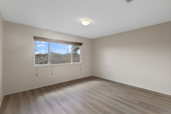 Building Photo - Perfect for Pets & Families! 4BR Ewa Beach Home with Fenced Yard & Pool Access