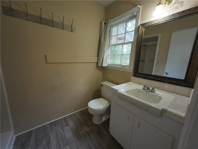 Building Photo - 5209 Maudelayne Dr N