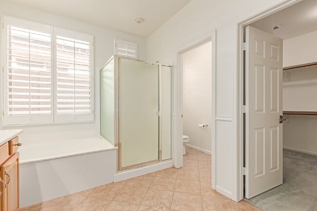 Building Photo - "Charming 2-Bedroom + Den Oasis with Spaci...