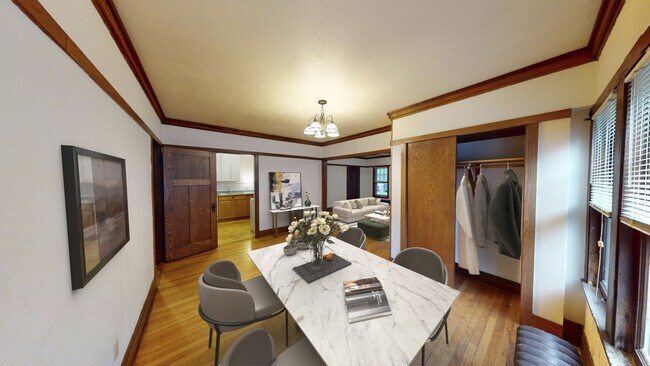 Dining Room Staged - The Badger Den Apartments on Kendall