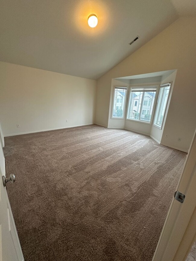 Building Photo - MOVE IN SPECIAL! Spacious 2 bed/2.5 bath with bonus room townhome off Road 68