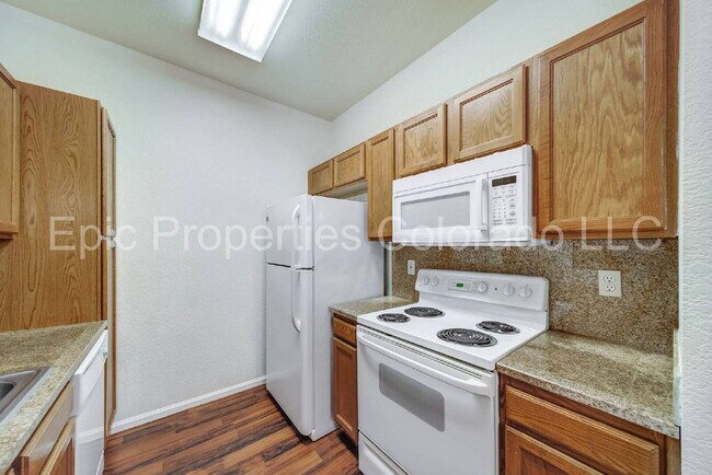 Building Photo - First Floor Corner 2 bed/2bath unit by Buckley SFB! Deeded Parking Right in Front!