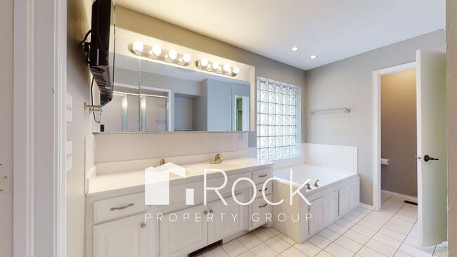 Building Photo - Need space? Take a look at this 4 Bedroom/...