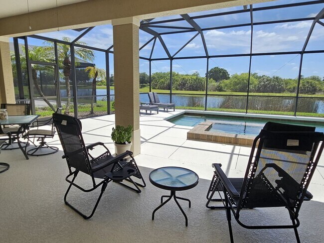 Building Photo - Seasonal Short-Term 3 Bedroom 2 Bathroom Heated Pool Home located in Venetian Club & River Club!