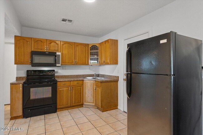 Building Photo - 6713 N 63rd Ave