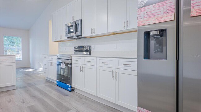 Building Photo - 4395 NE 33rd Ave