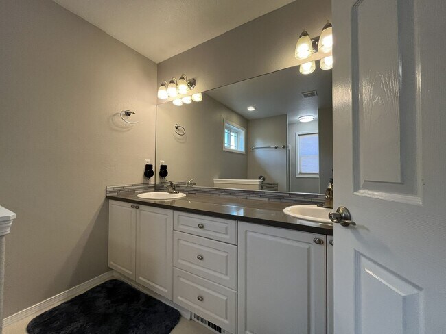 Building Photo - Spacious 3-Bedroom Home with Two Living Areas, Private Balcony, Fireplace & Attached 2-Car Garage