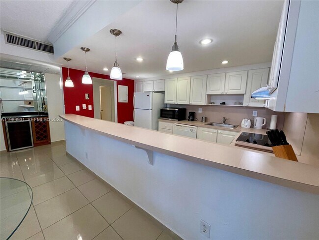 Building Photo - 19390 Collins Ave