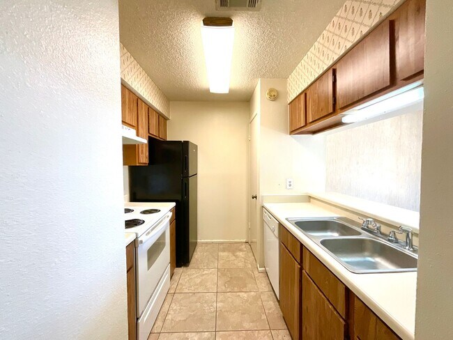 Building Photo - Move-In Ready 2BD/2BA with Fireplace, In-Unit Laundry & Community Pool!