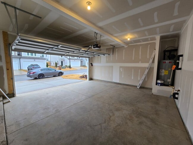 Building Photo - NEWLY BUILT END UNIT TOWNHOME