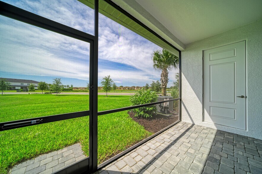 Building Photo - 2206 Washington Palm Ct