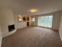 Building Photo - Fenced yard, Spacious 3 bedroom Home