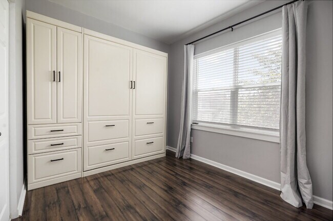 Building Photo - Starter 2 Bedroom with Dedicated Parking Space