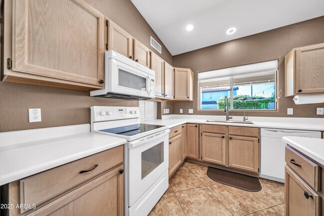 Building Photo - 5639 E Aire Libre Ave