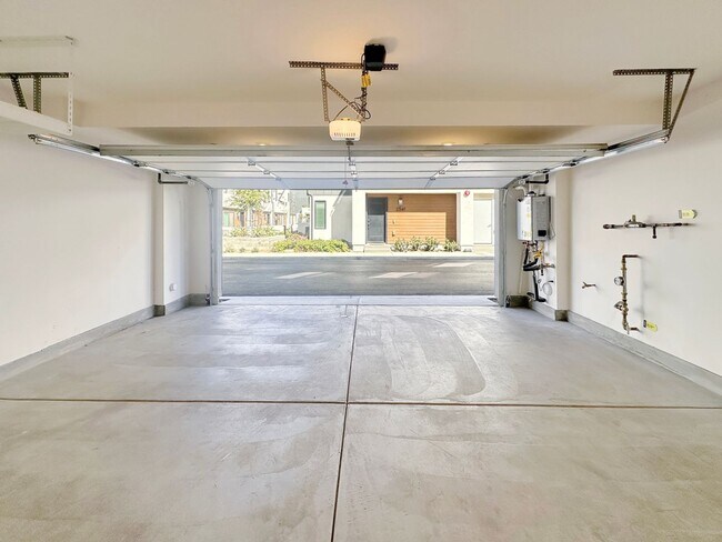 Building Photo - Luxury 3-Level Townhome for Rent | 2BR + 3BA | 1,500 Sq Ft with 2-Car Garage