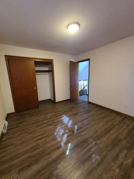 Upper Level: 1st Bedroom - 217 S Water St