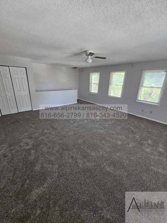 Building Photo - Home in NE with HUGE Primary Bedroom! Vouchers OK
