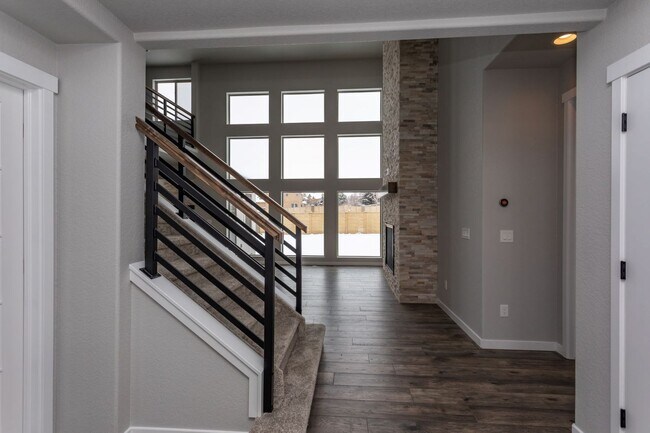 Building Photo - Exceptional 4-Bedroom Home with Dual Fireplaces, Main Level Master Suite, and Spacious Basement -...