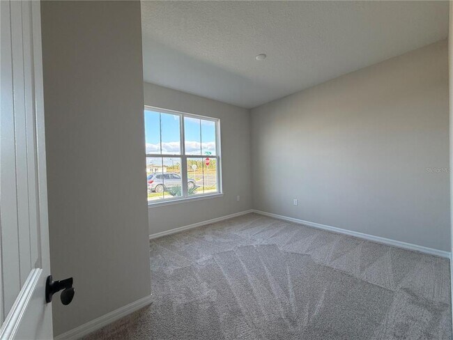 Building Photo - 5648 Flame Vine Wy