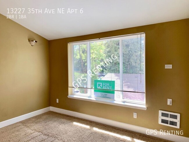 Building Photo - Top floor Condo filled with light