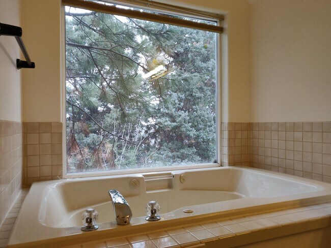 Building Photo - Spacious and charming, this two-story 4 be...
