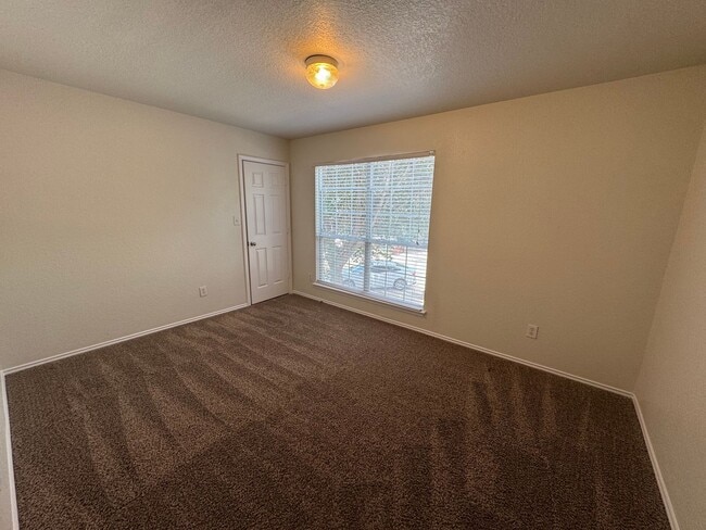 Building Photo - CUTE 2-STORY NESTLED ON A CUL-DE-SAC FEATURING AN ISLAND KITCHEN WITH STOVE/RANGE, DISHWASHER, MI...