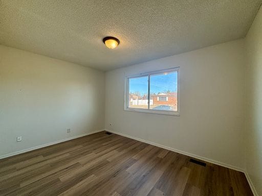 Building Photo - Spacious 5-Bedroom Single-Family Home with Fenced Yard & Garage