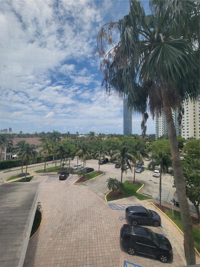 Building Photo - 19380 Collins Ave