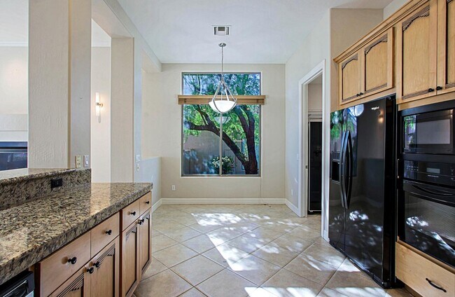 Building Photo - 9311 E Cavalry Dr