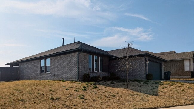 Building Photo - Spacious Yukon Home with Storm Shelter, 2-Car Garage & Fenced Yard!
