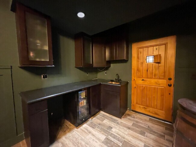 Building Photo - Live Lavishly in Harmony Ridge- Fully Furnished 5-Bedroom Dream Home with Backyard Oasis & Speake...